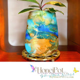 Caribbean jewel inspired plant pot shimmering in accents of pearl and gold highlights